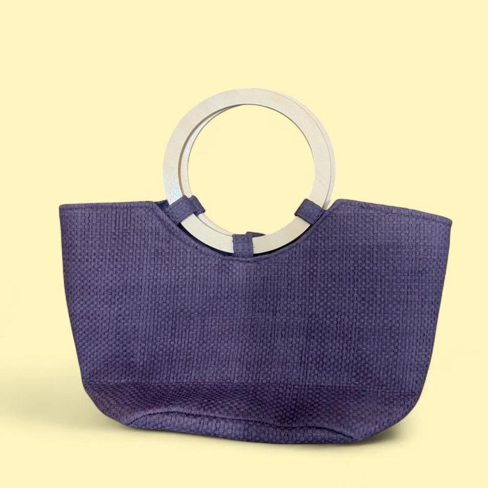 Purple woven tote bag with wooden handle